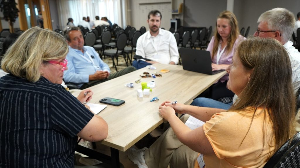 Dr. Inga Zasada, PAPAS Project Co-Director and Nematologist/Owner of Nema Solutions, in discussion with participants at the Potato Nematode Stakeholder Workshop
